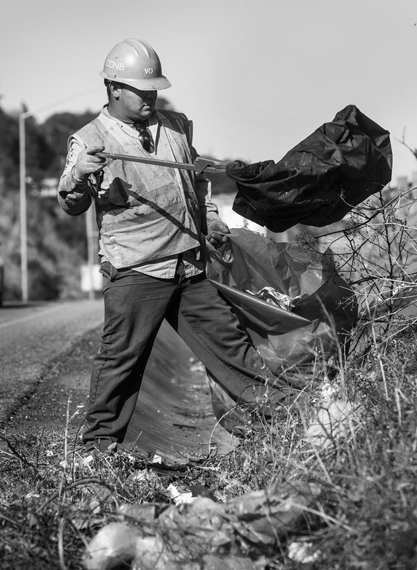 Conservation Corps North Bay, CCNB, picking up litter on U.S. Highway 101