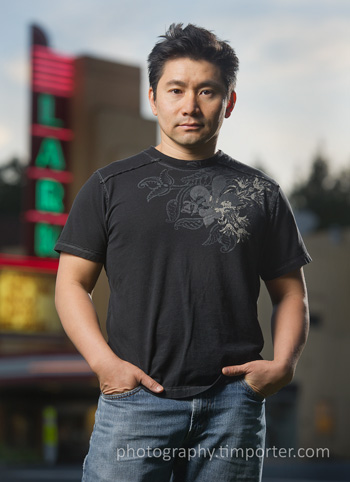 John Truong, photographer, in front of the Lark Theater